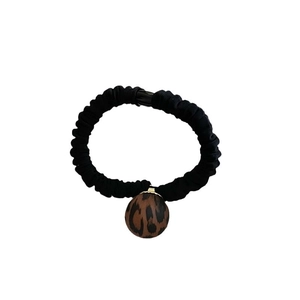 Matte leopard print ball hair tie with black elastic band for stylish ponytails