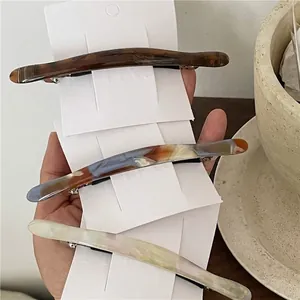 Three-piece acetate hair clips set with tortoise shell and marble texture designs