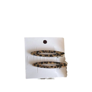 Paire de barrettes ovales évidées en acétate avec motif léopard et écaille de tortue