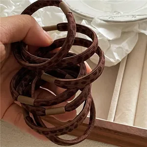 Elastic leopard print hair scrunchies with golden buckle and textured fabric set