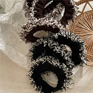 Fringed plush scrunchie set for women in black and brown minimalist vintage style
