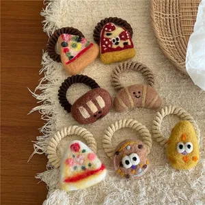 Cute handmade wool felt hair ties featuring pizza, cheese, and bread shapes for girls
