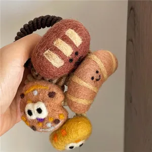 Cute cartoon wool felt bread and pizza hair ties with funny facial expressions