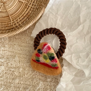 Detailed view of handmade wool felt pizza charm on brown spiral elastic hair tie