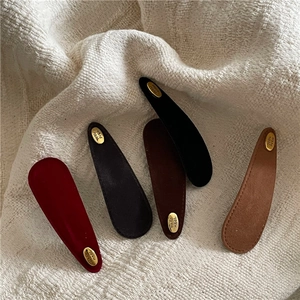 Retro suede teardrop BB hair clips with gold handmade tags in multiple autumn colors