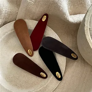 Retro suede teardrop hair clips set with gold 'Handmade' metal logo in five classic colors