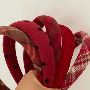 Set of festive red padded headbands with polka dots and checkered patterns for women