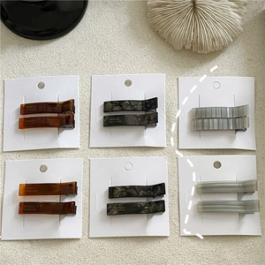 Elegant cellulose acetate geometric hair clip set in amber and tortoise shell patterns