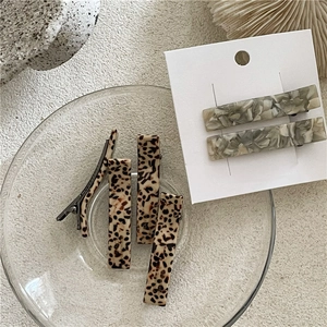 Elegant acetate geometric hair clip set with leopard print and marble texture patterns