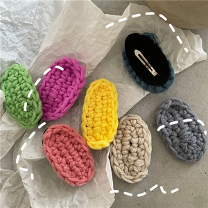 Set of seven colorful knitted oval hair clips with silver metal snap closures for women