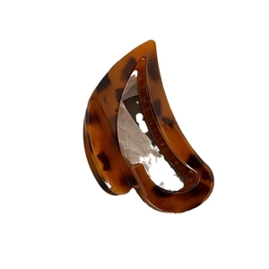 Elegant tortoiseshell claw clip with hollow cutout design for French style hair updos