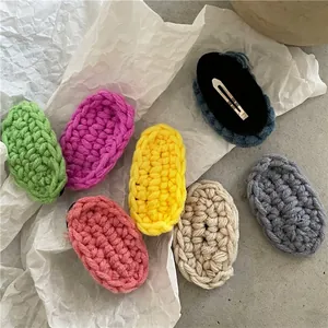 Chic cream-colored knitted oval BB hair clips set with various pastel yarn colors