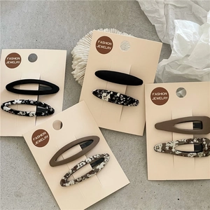 Lot de barrettes à fleurs et mates géométriques en formes ovales et gouttes d'eau