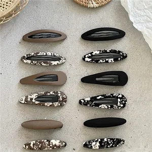 Lot de 12 barrettes à cheveux aux motifs floraux et couleurs unies en forme de goutte
