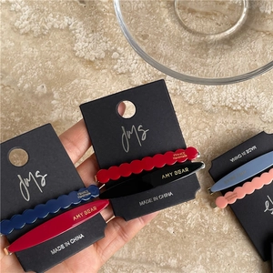 Elegant geometric acetate hair clips set with wave and leaf shapes in five colors