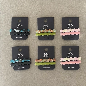Chic cellulose acetate wavy hair clips in marble and tortoiseshell patterns, set of 12 pieces