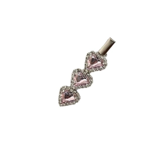 Chic silver hair clip featuring three pink heart rhinestones with sparkling white crystals