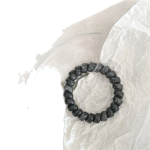 Minimalist gradient telephone wire hair tie with black and grey marble texture design