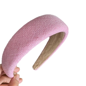 Pink thickened sponge headband with textured woven fabric and soft non-slip inner lining