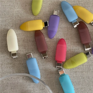 Flat lay of colorful candy-colored jelly hair clips on a linen texture background