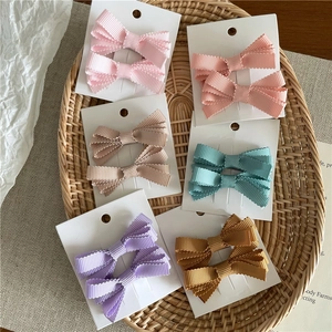 Set di 6 paia di fermagli per capelli a fiocco in nastro colorato per ragazze su carta
