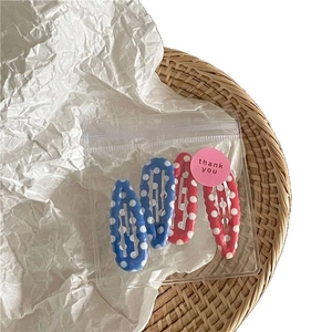 Schattige polkadots BB-haarspeldjes set met blauwe en rode metalen clips in zakje