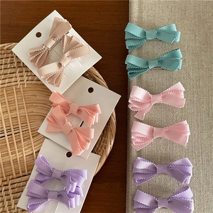 Set di fermagli per capelli a fiocco color pastello beige rosa viola e ciano