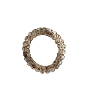 Élastique à cheveux spirale marron translucide avec motif léopard et design extensible