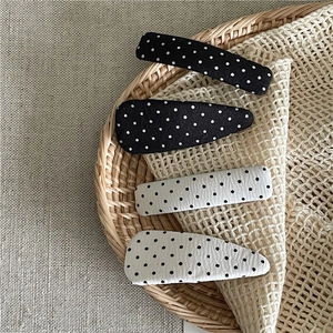 Polka dot hair clip set with black and white drop-shaped and rectangular hairpins