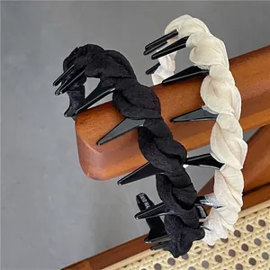 Cerchietto in tessuto a rete con denti antiscivolo nei colori nero e beige
