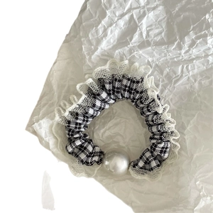 Classic black and white houndstooth scrunchie with white lace trim and large faux pearl