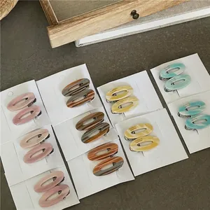 Barrettes géométriques minimalistes en acétate avec motif de marbre élégant