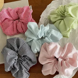 Lot de cinq chouchous en tissu à carreaux aux couleurs pastel pour queues de cheval