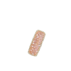Sparkling pink crystal rectangular hair clip with rhinestones and gold-plated borders