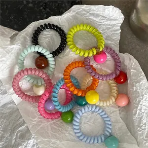 Élastiques à cheveux spirales multicolores avec perles décoratives en lot varié