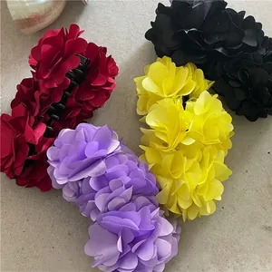 Set of four large burgundy and assorted floral banana clips for ponytail styling