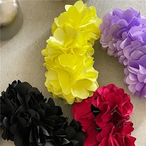 Floral large banana hair clips in red, purple, yellow and black for elegant ponytails