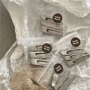 Minimalist matte silver wavy and rectangular metal hair clip set for women with handmade labels