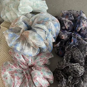 Floral print organza scrunchies in various colors for elegant ponytail styling