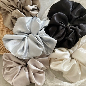Silky satin oversized scrunchies in multiple solid colors for elegant ponytails