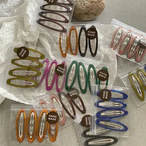 Colorful drip glaze geometric oval snap hair clips set with handmade label in various shades