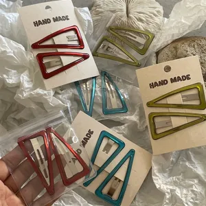 Set di fermagli per capelli BB geometrici a triangolo colorati per donna in rosso e verde