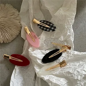 Lot de 6 barrettes ovales pailletées à carreaux avec inscription France Handmade dorée
