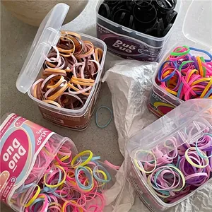 Colorful high elasticity TPU disposable hair bands in clear rectangular gift boxes