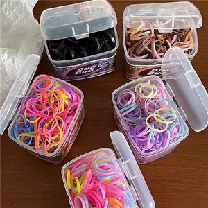 Five boxes of colorful TPU elastic hair bands for girls in high-stretch ponytail styles