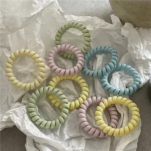 Lot de chouchous spirale téléphone aux couleurs pastel menthe, rose et jaune