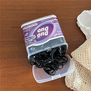 Bulk pack of high-elastic black TPU hair ties for girls in a storage box for styling