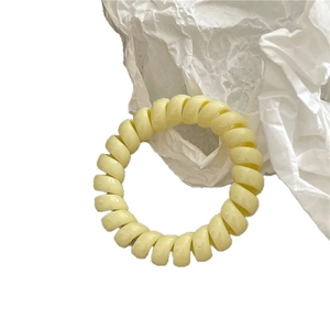 Élastique spirale jaune crème type cordon de téléphone à haute élasticité pour cheveux
