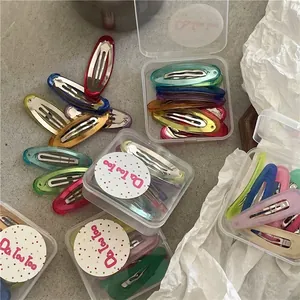 Set di fermagli per capelli BB ovali colorati in tonalità pastello con scatola chiara