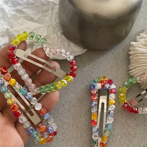 Elegant beaded hair clips with colorful crystal heart and waterdrop shapes for women